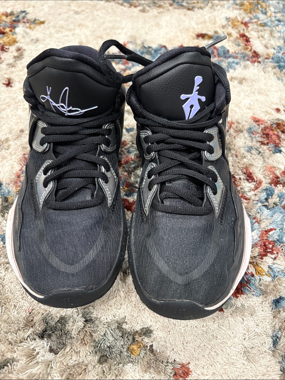 Nike Black Youth Sneakers with White Label Detail